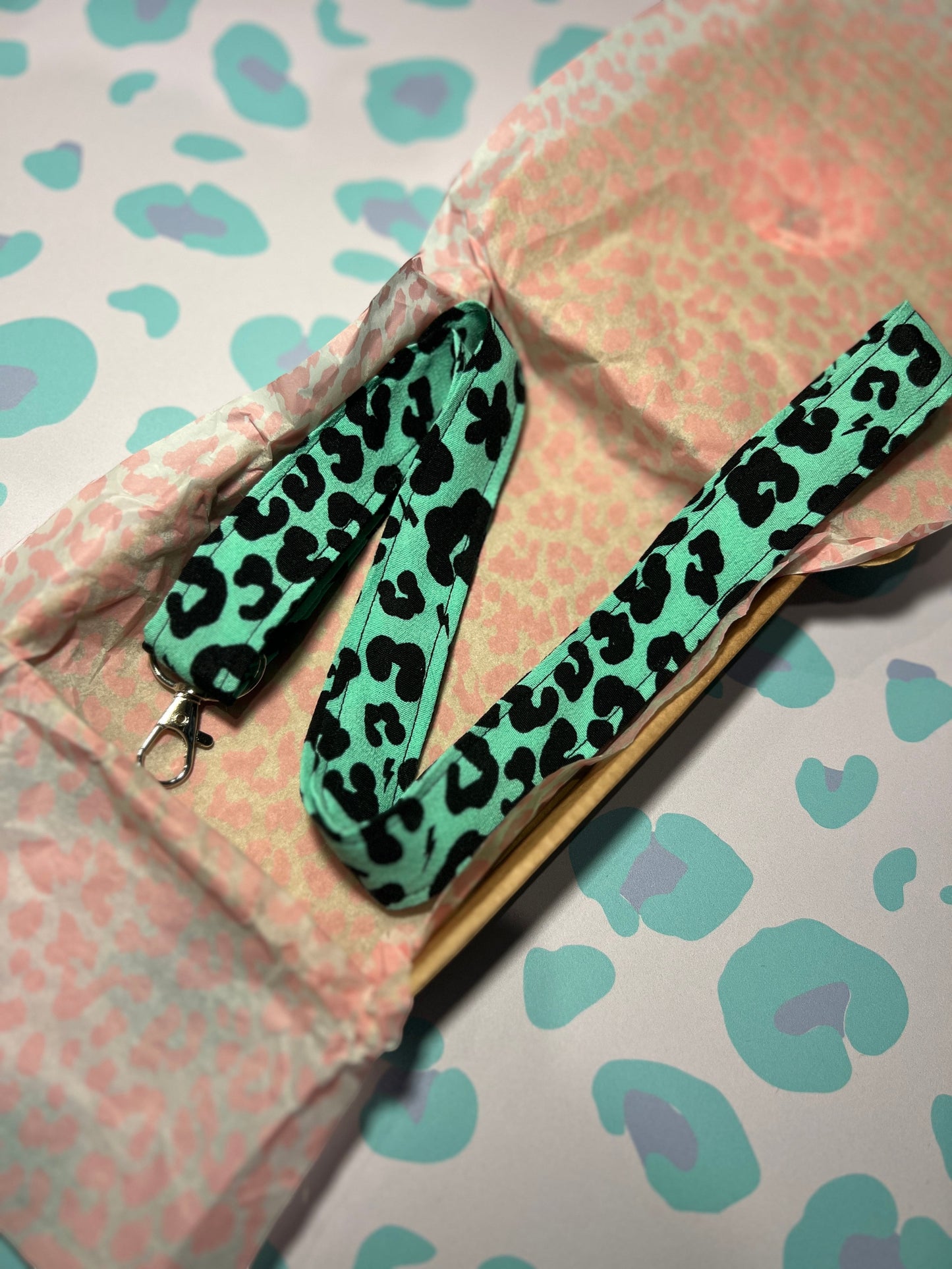 Sew Much Love green floral leopard print fabric lanyard with D-ring and swivel clasp for keys and ID badges.