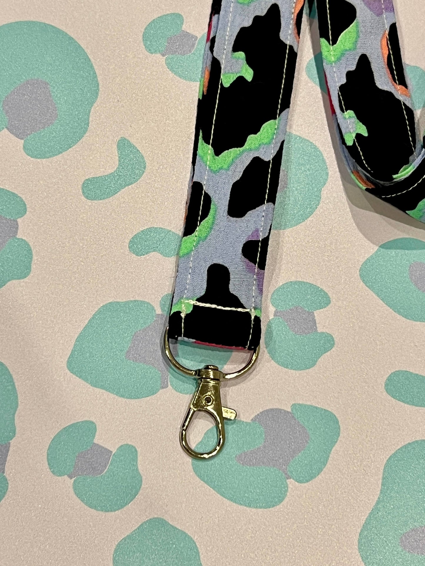 Sew Much Love light blue lanyard with rainbow leopard print and silver clasp. Soft eco viscose.