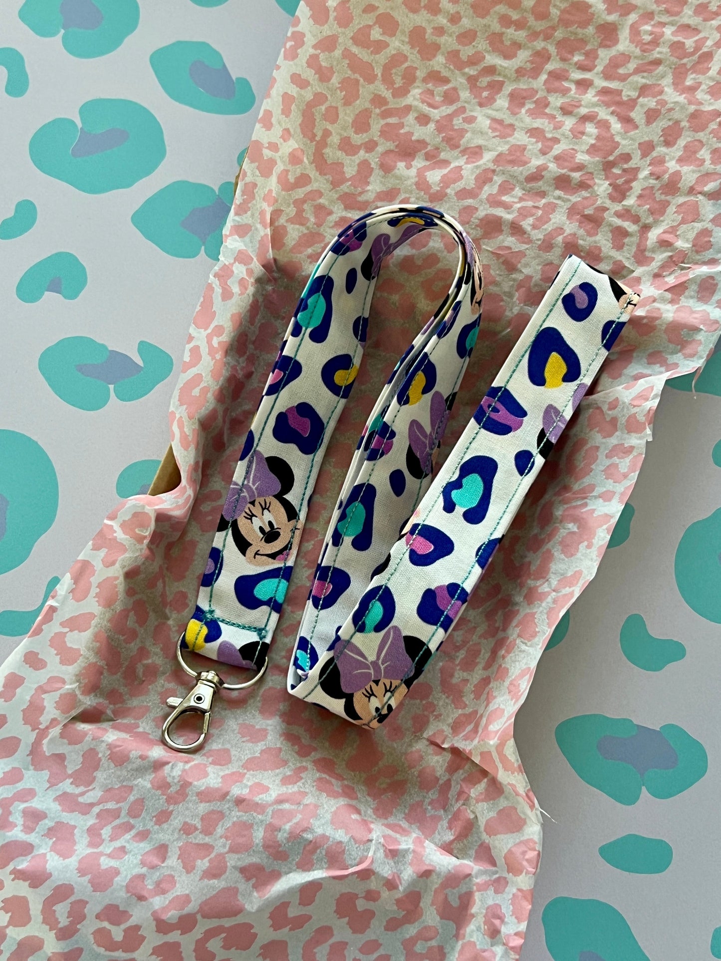 Sew Much Love Minnie leopard print cotton lanyard with purple bow and swivel clasp.