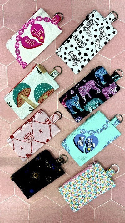 Sew Much Love Blazing Bengals coin purse with neon tigers in blue, pink, and teal on black fabric. Features keyring.