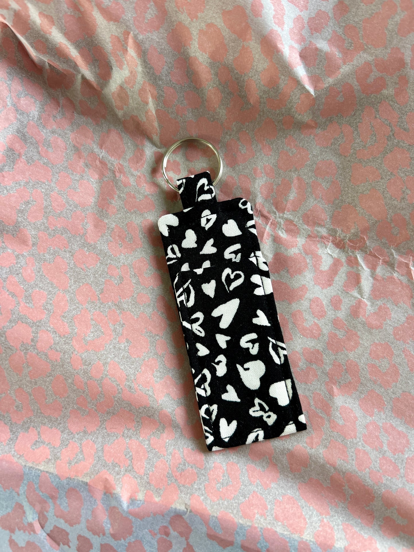 Sew Much Love black and white hearts lip balm holder with keyring, made from viscose.