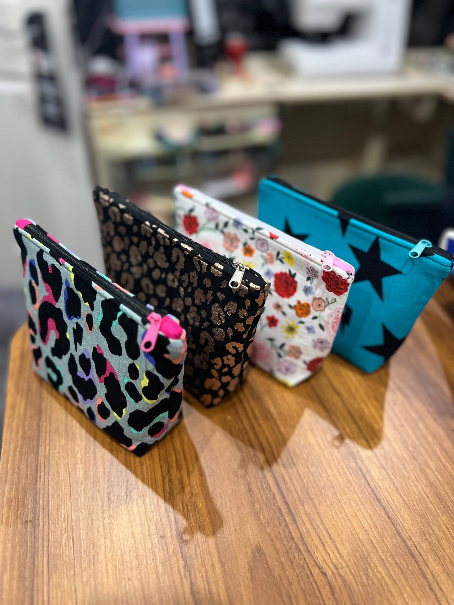 Sew Much Love mini cosmetic bags in leopard print, floral, and star patterns. Eco viscose fabric, handmade in the UK.
