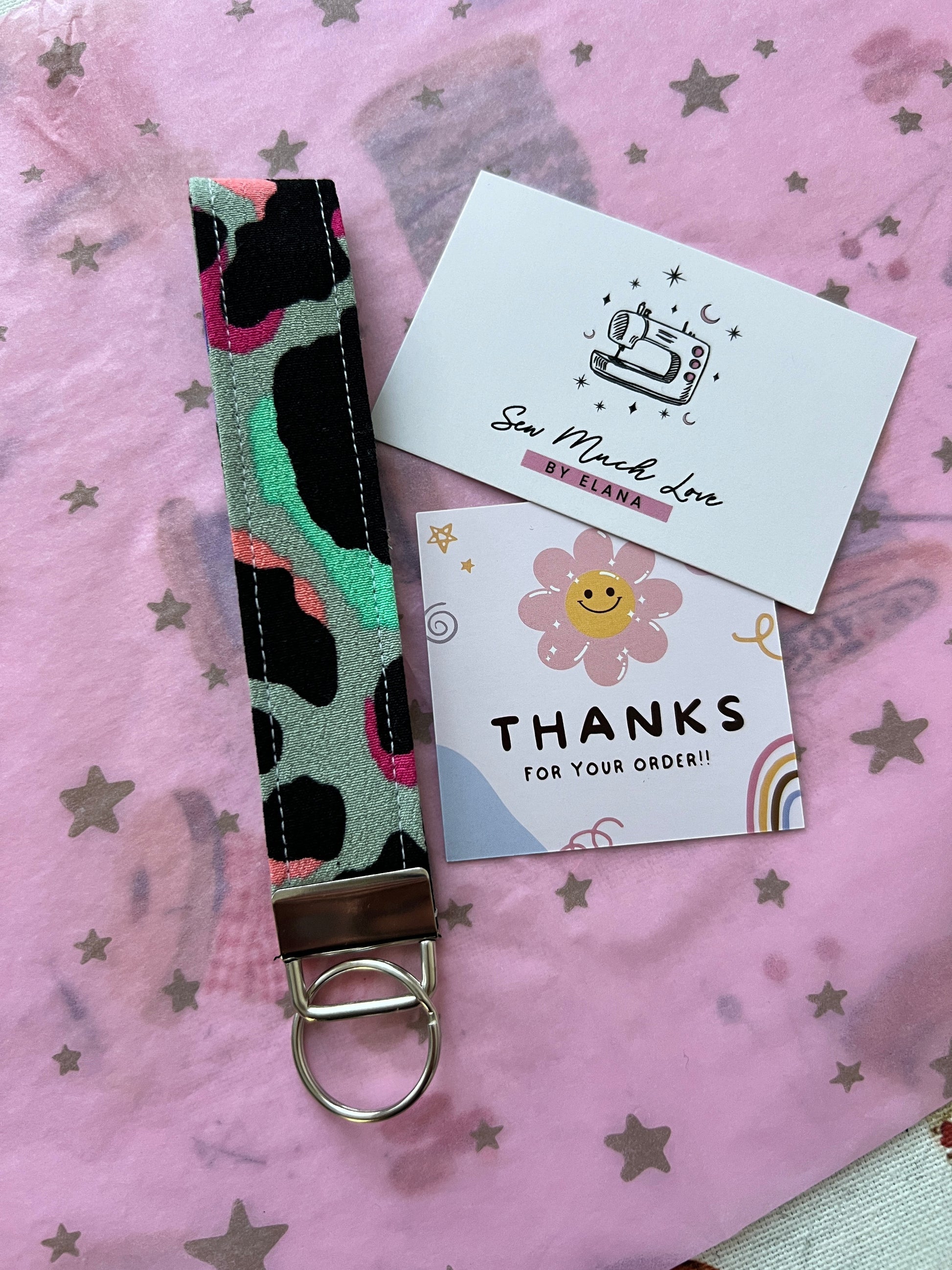 Sew Much Love khaki rainbow leopard print cotton wristlet keychain with silver hardware.