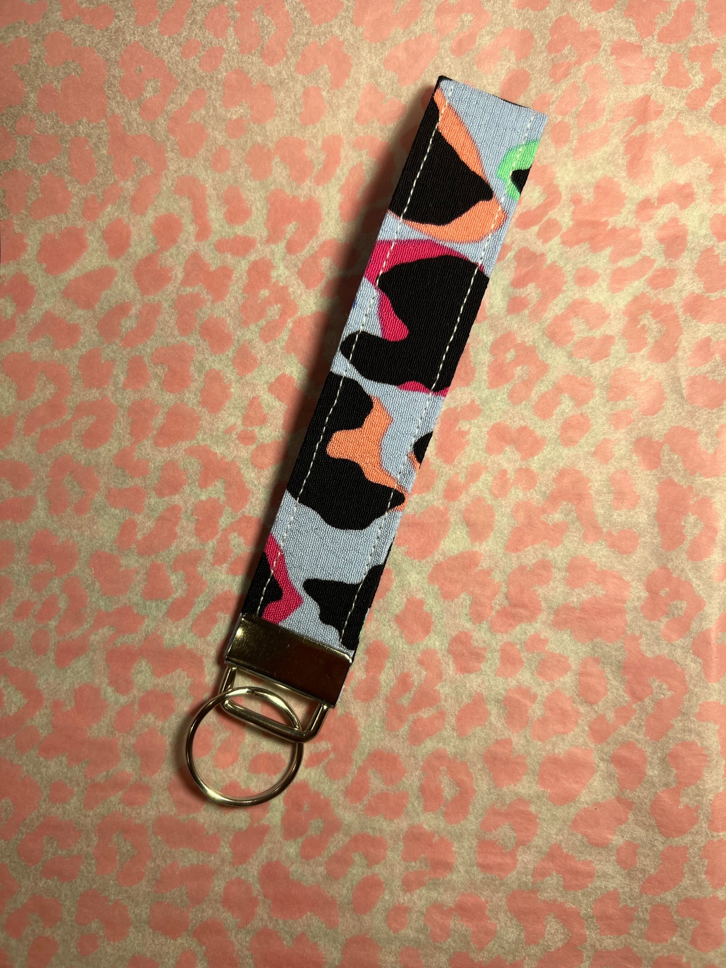 Sew Much Love light blue wristlet keychain with rainbow leopard print, made of cotton.