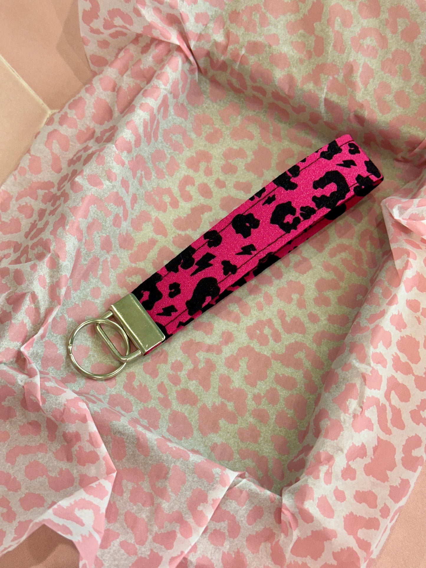 Sew Much Love raspberry pink leopard print fabric wristlet keychain with silver hardware. Adds a pop of color and convenience.