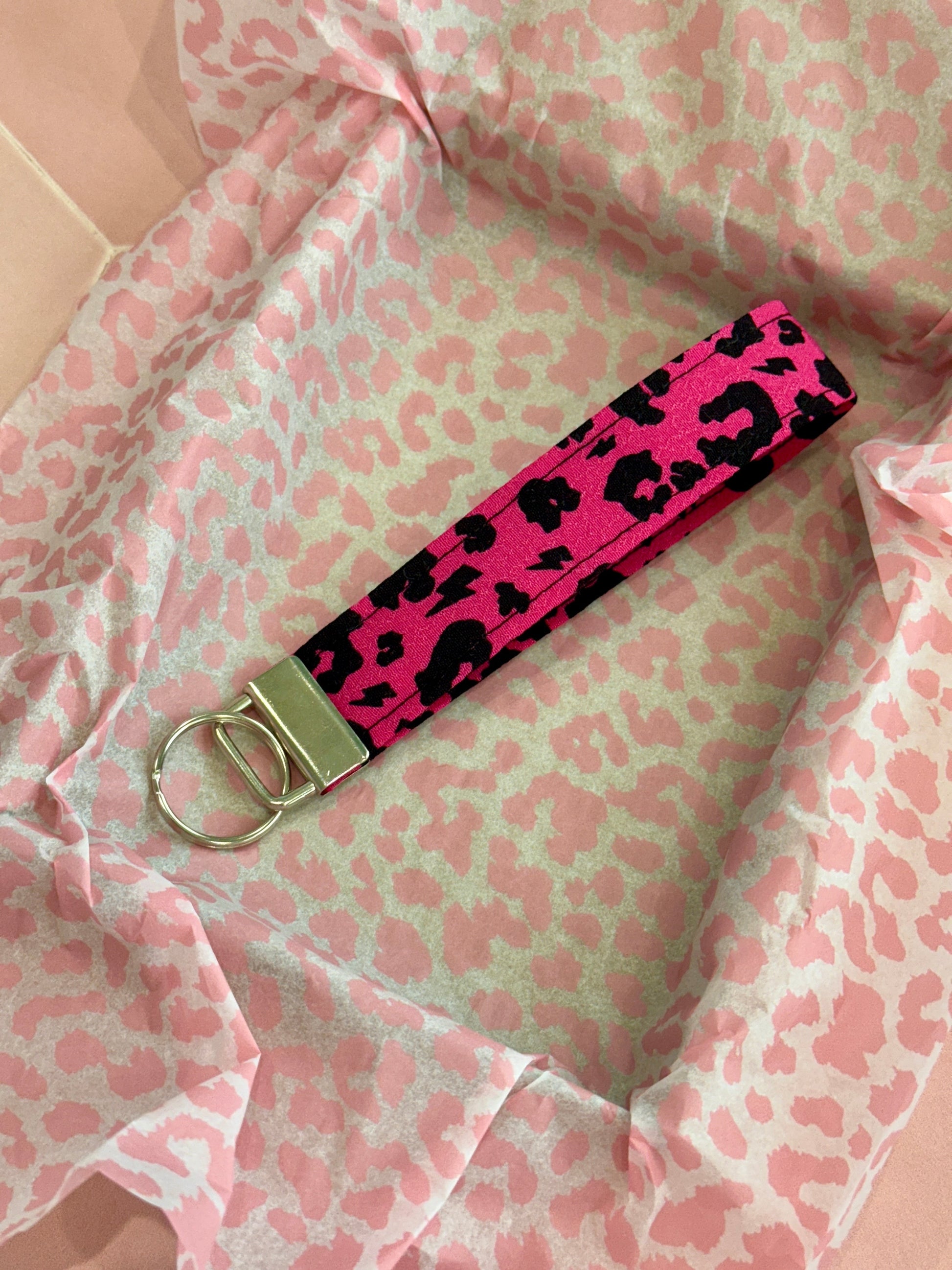 Sew Much Love raspberry pink leopard print fabric wristlet keychain with silver hardware. Adds a pop of color and convenience.