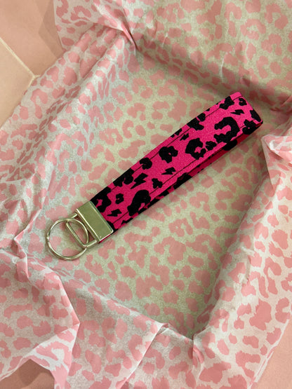 Sew Much Love raspberry pink leopard print fabric wristlet keychain with silver hardware. Adds a pop of color and convenience.