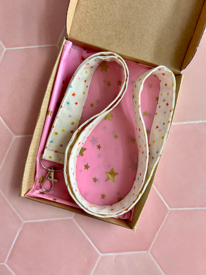 Handmade rainbow mini star lanyard with D-ring for keys and ID badges, presented in a kraft gift box with pink star tissue paper, small business accessories UK