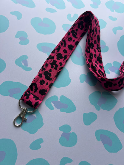 Sew Much Love raspberry pink fabric lanyard with black leopard print and silver D-ring. Handmade for keys and ID badges.