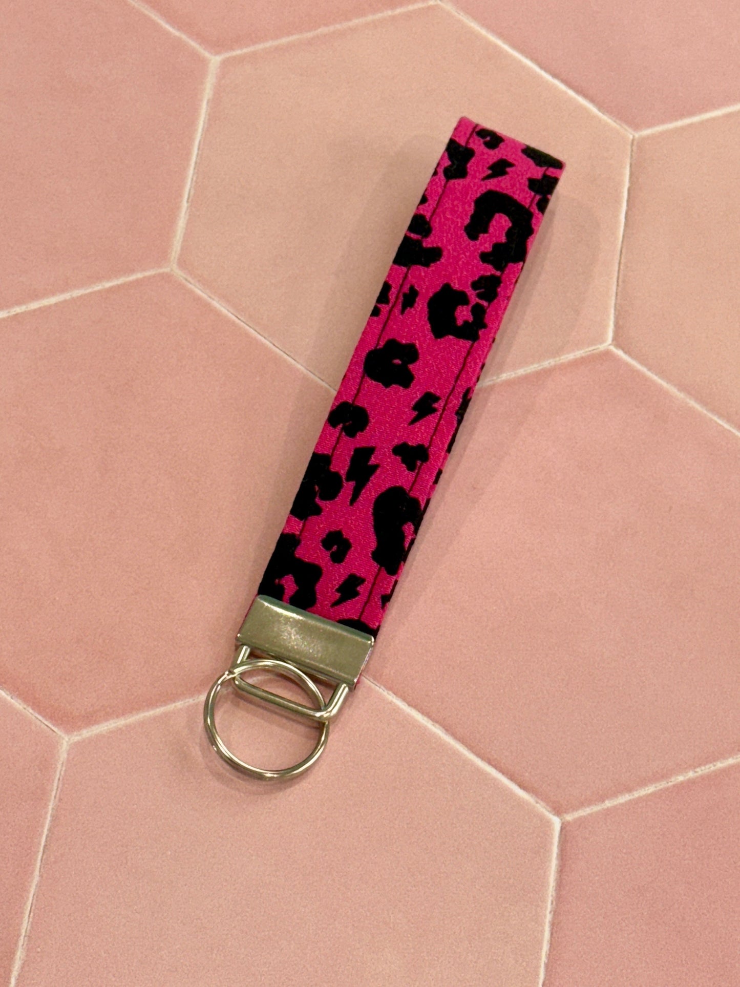 Sew Much Love raspberry pink leopard print fabric wristlet keychain with silver hardware and keyring.