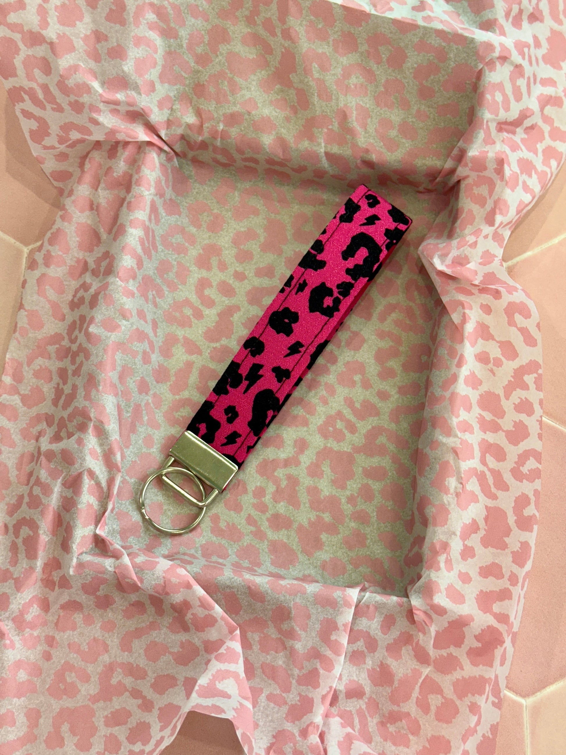 Sew Much Love raspberry pink leopard print fabric wristlet keychain with silver hardware.