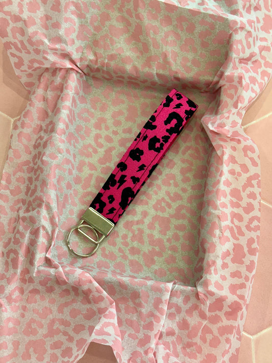 Sew Much Love raspberry pink leopard print fabric wristlet keychain with silver hardware.