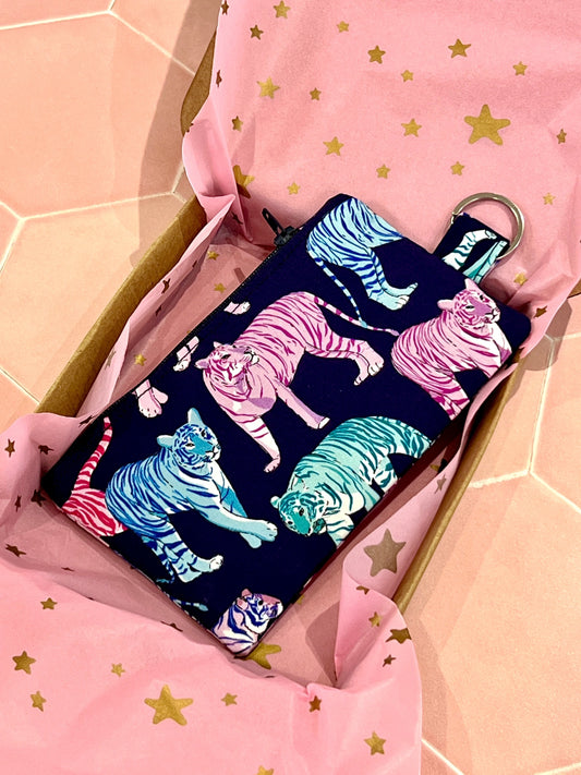 Sew Much Love Blazing Bengals coin purse with neon tigers in blue, pink, and teal on navy. Features keyring attachment.