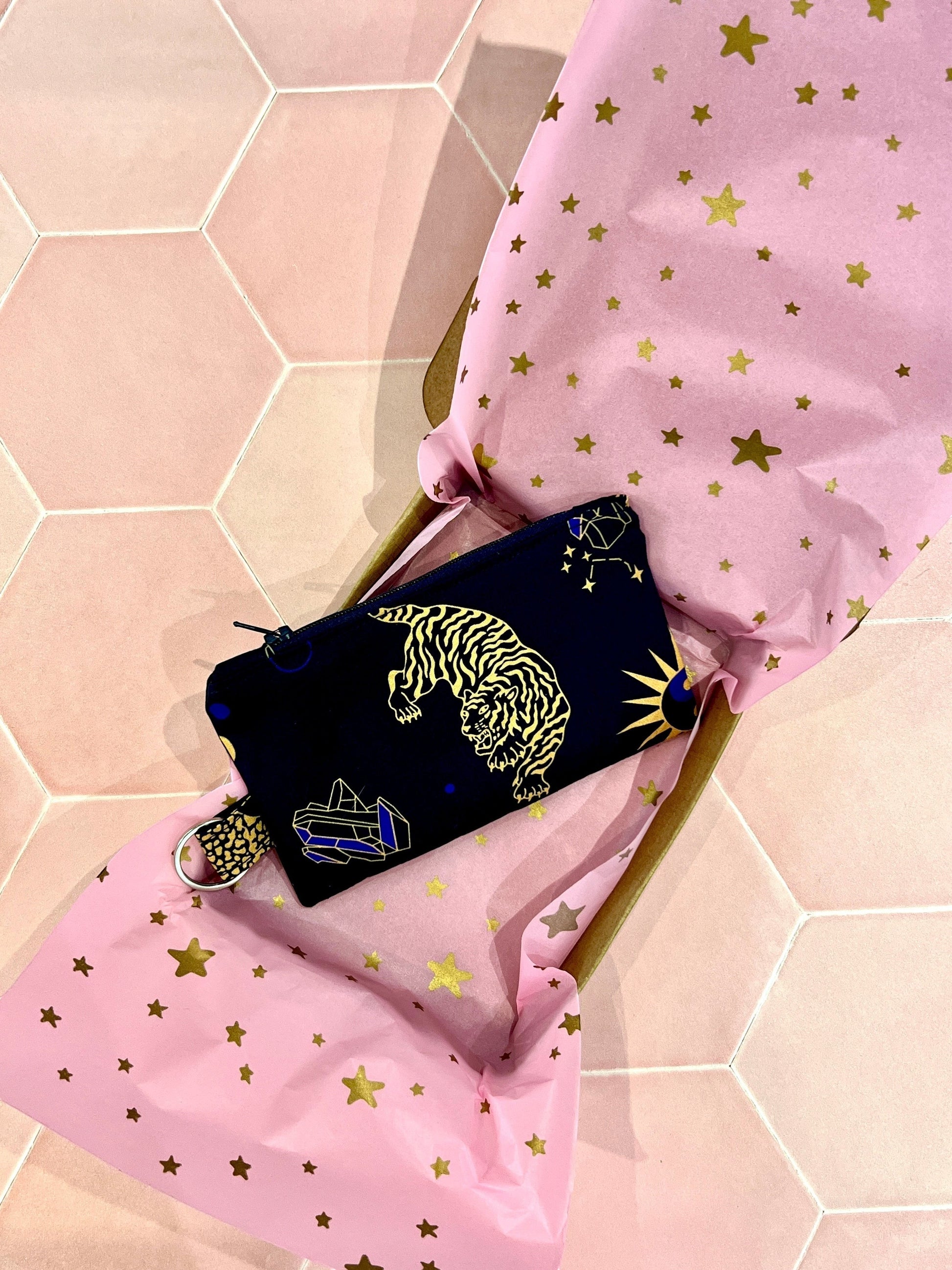 Sew Much Love Celestial Cats coin purse with golden tigers, constellations, and crystals on a dark blue background.