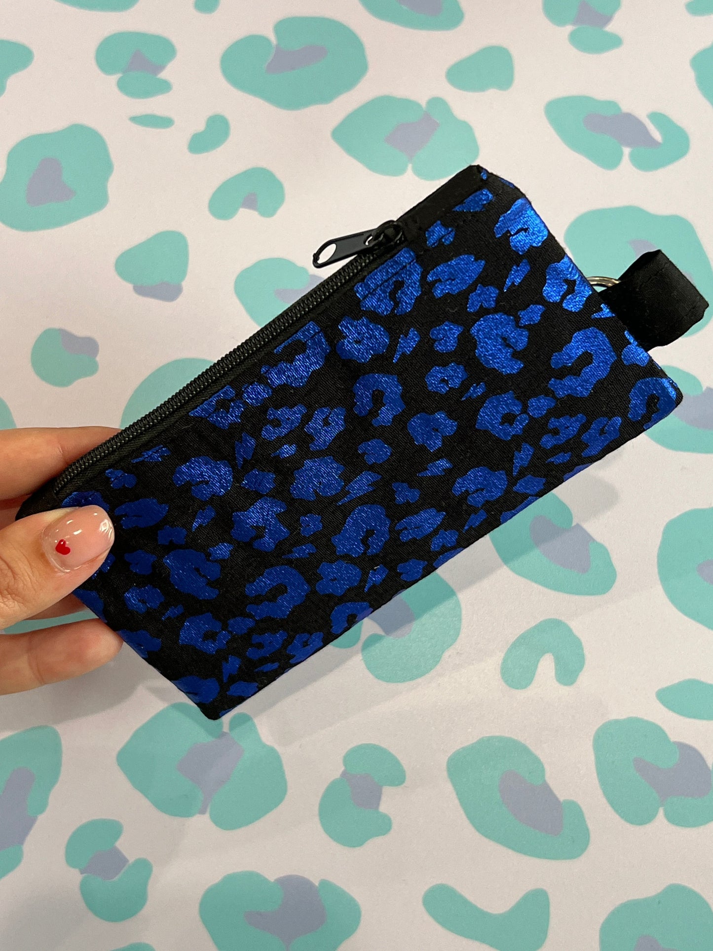 Sew Much Love blue and black leopard print coin purse with zip closure and keyring attachment.