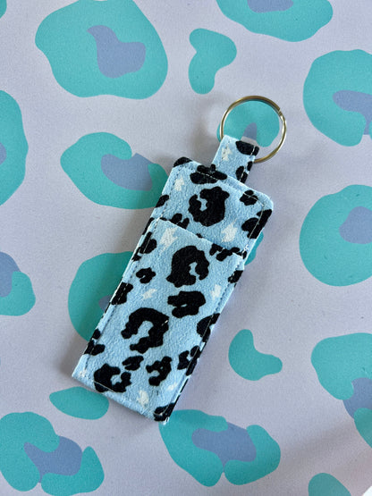 Sew Much Love light blue leopard print cotton lip balm holder with silver keyring.