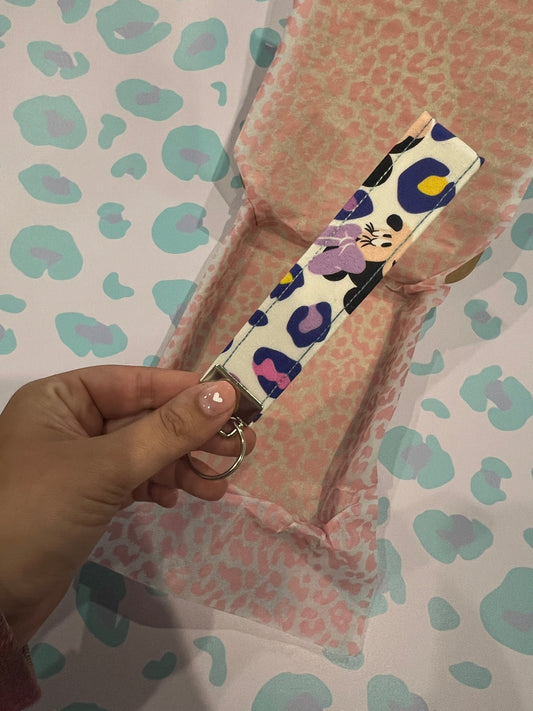 Sew Much Love pastel leopard print wristlet keychain with Minnie graphic, made of cotton.