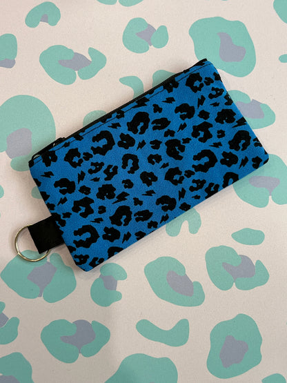 Sew Much Love blue leopard print coin purse with black zip and keyring attachment.