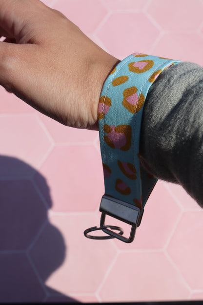 Sew Much Love blue and pink leopard print cotton wristlet keychain with metal hardware.