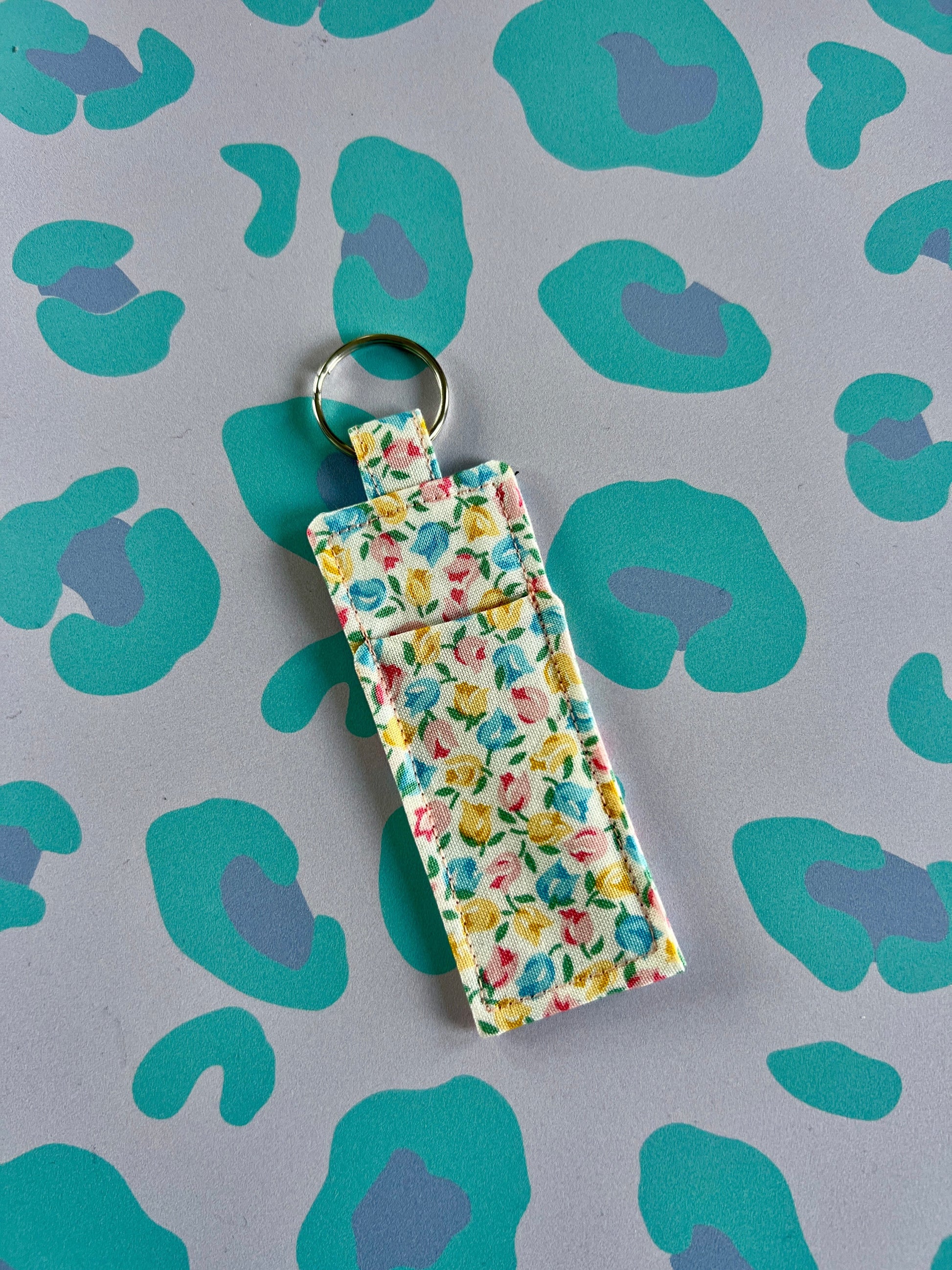 Sew Much Love Liberty Tiny Tulips floral print cotton lip balm holder with keyring.