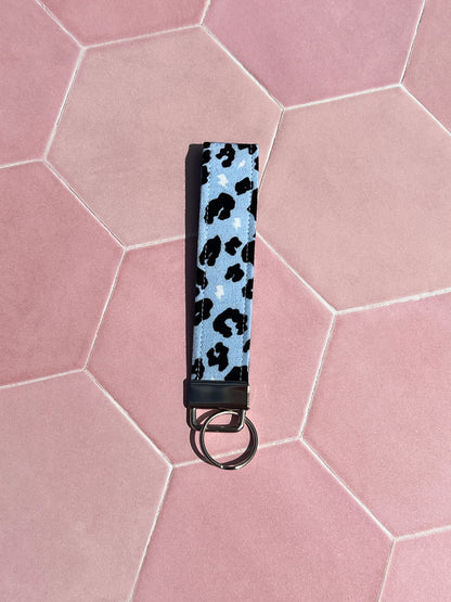 Sew Much Love light blue leopard print wristlet keychain made from eco viscose fabric with silver hardware.