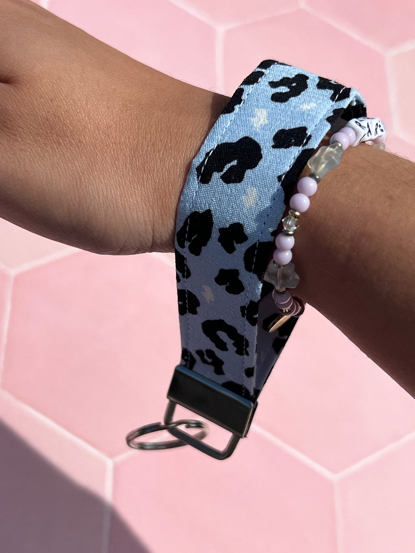 Sew Much Love light blue leopard print wristlet keychain made of cotton.