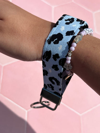 Sew Much Love light blue leopard print wristlet keychain made of cotton.