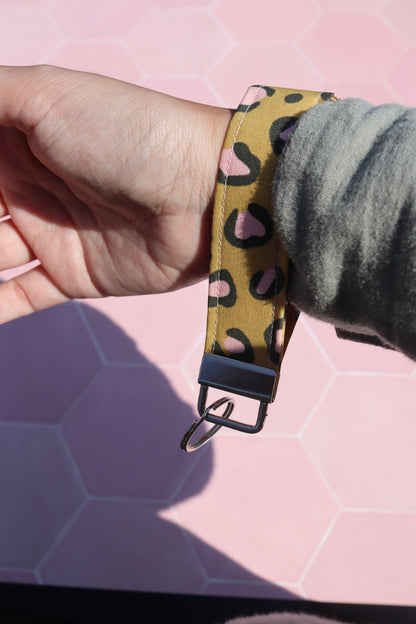 Sew Much Love mustard and pink leopard print cotton wristlet keychain with metal hardware.