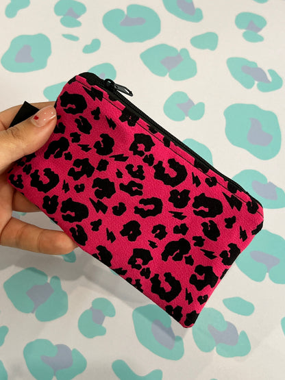 Sew Much Love handmade pink leopard print coin purse with black zipper and lining.