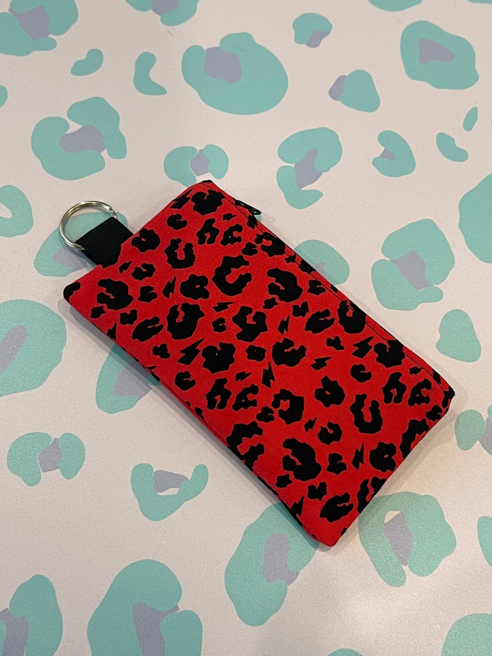 Sew Much Love red and black leopard print coin purse with keyring attachment.